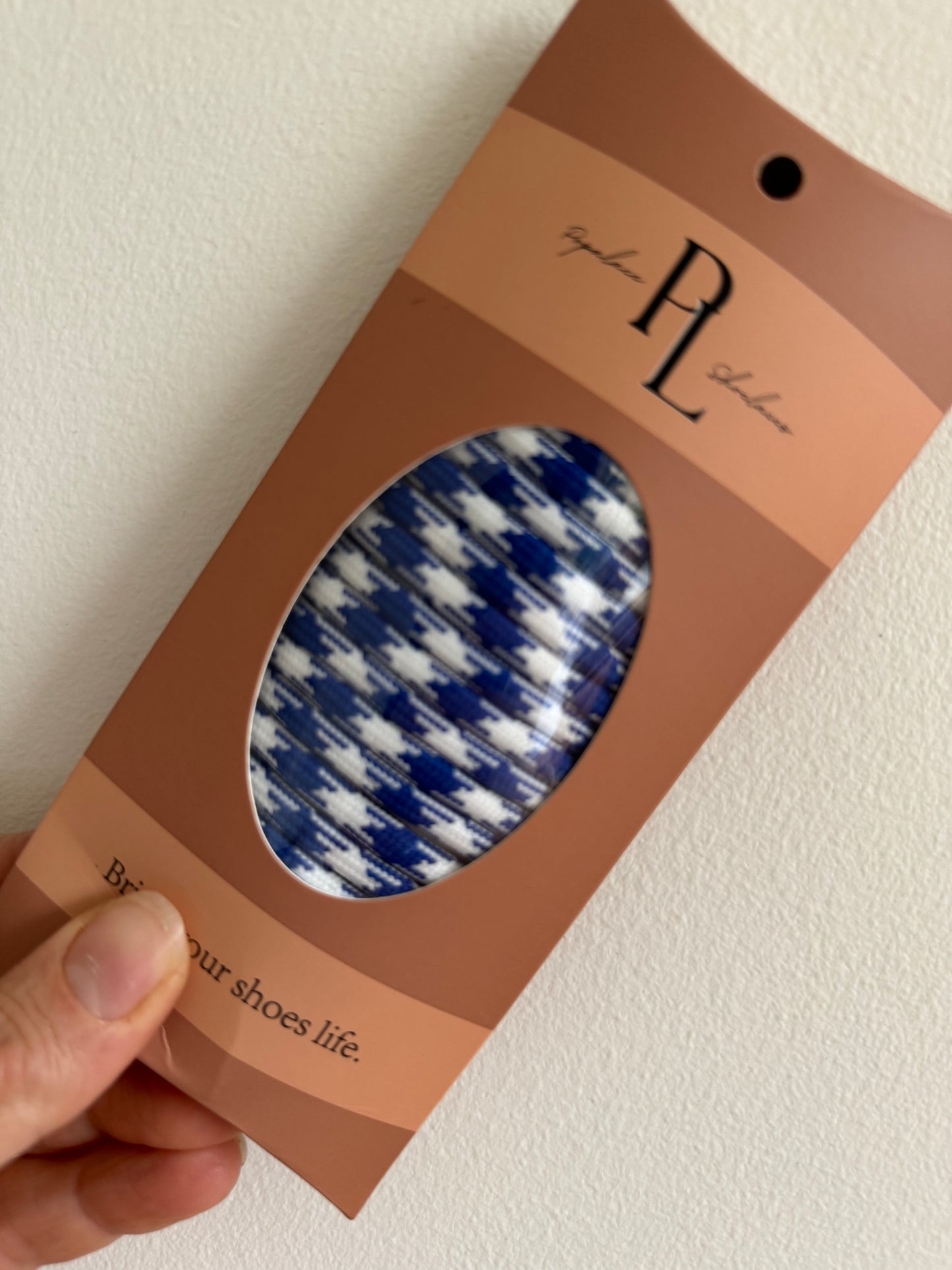 Dark blue and white houndstooth shoelaces